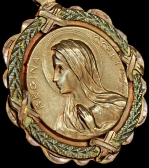 gold pendant with image of Virgin Mary